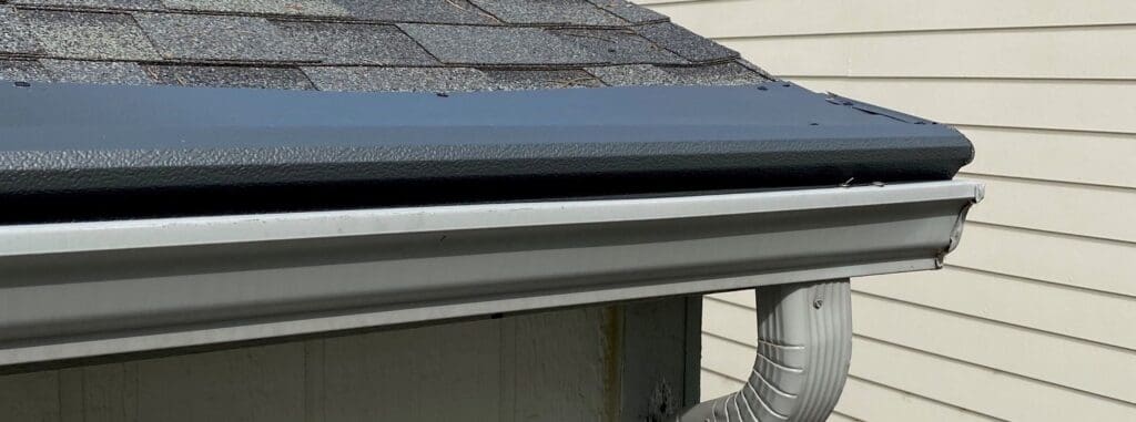 Seamless gutters and a gutter helmet installed on a home in Canton Township, MI