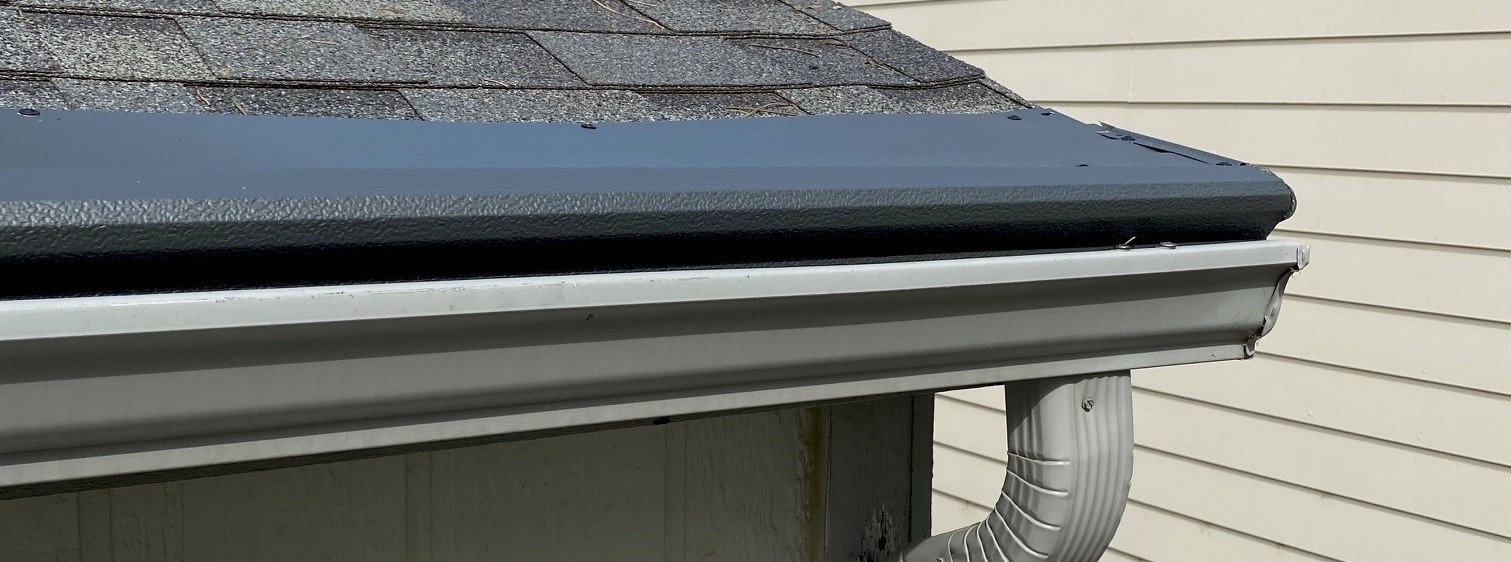 Seamless gutters and a gutter helmet installed on a home in Canton Township, MI