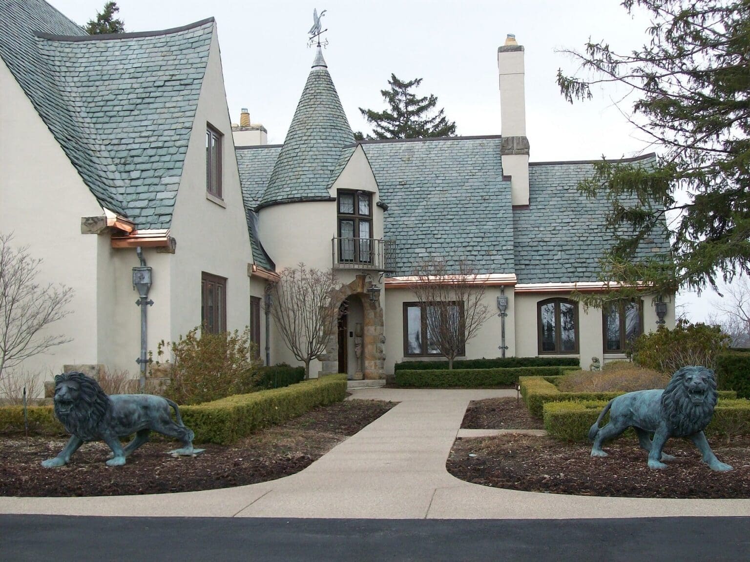 Home in Michigan with slate roof and copper gutters.