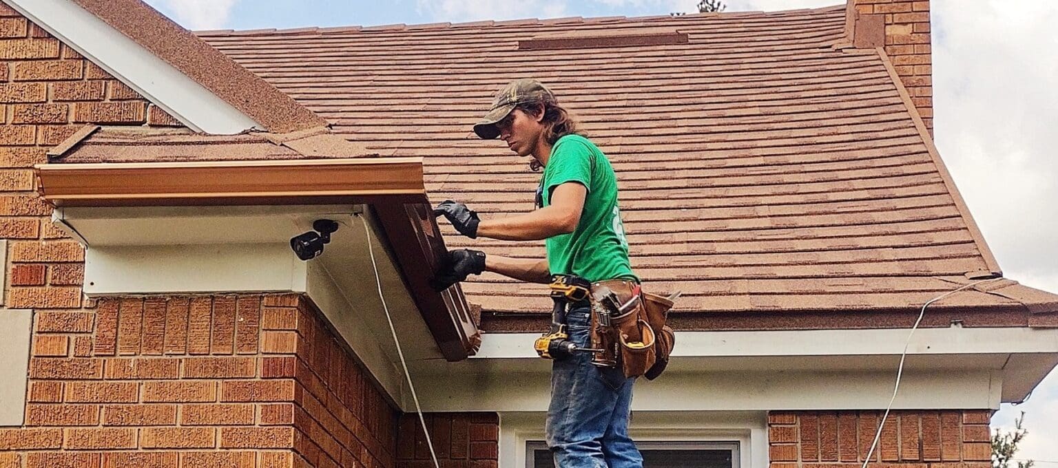 Gutters being installed