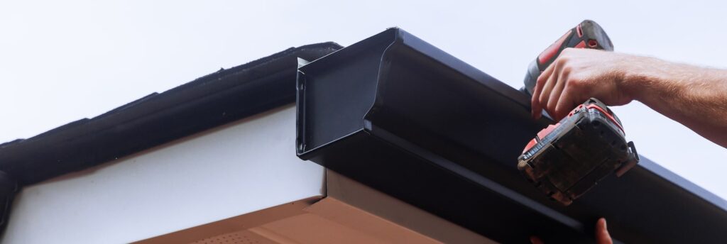 K-style gutter being installed.