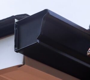 K-style gutter being installed.